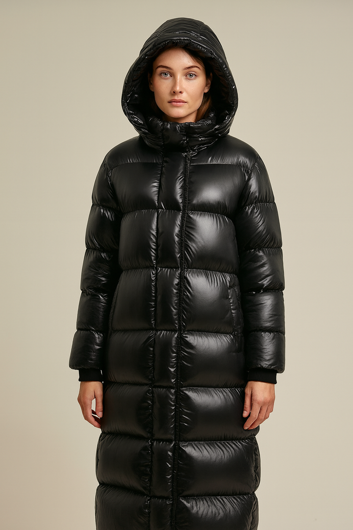 Women's long quilted hooded winter jacket. Warm, padded maxi coat for cold weather fashion & outdoor wear.