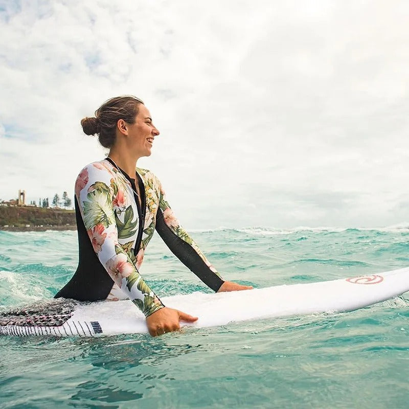 Athletic long sleeve one-piece swimsuit for women, perfect for active swimming, surfing, or beach sports.