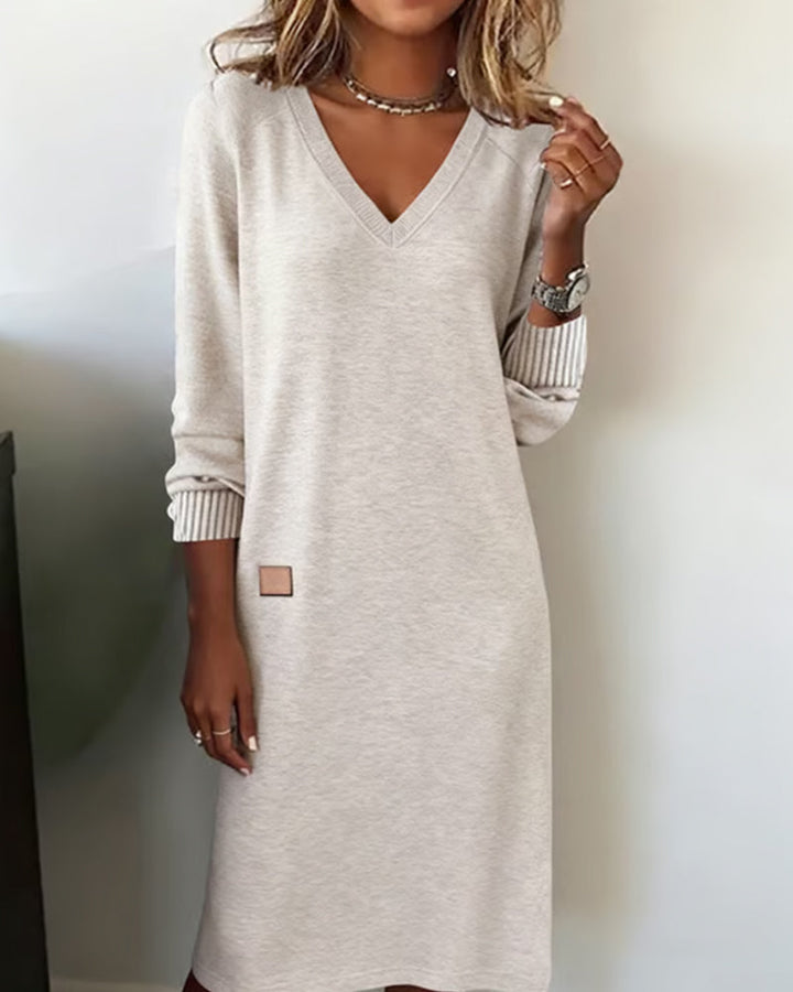 Women's long sleeve V-neck midi dress, perfect for office or casual everyday wear. Comfortable & sophisticated.