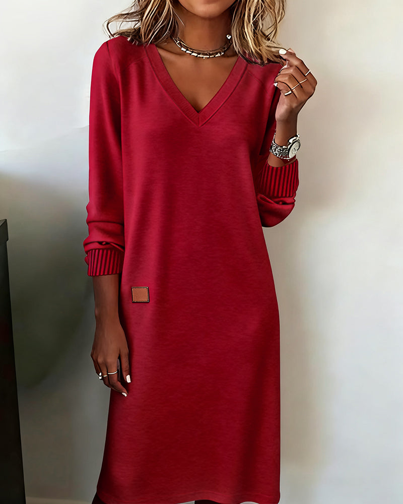Elegant V-neck long sleeve midi dress. Sophisticated office wear or chic casual outfit for women.