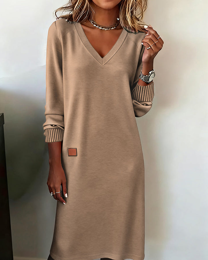 Relaxed fit V-neck long sleeve midi dress. Comfortable women's dress for office, casual, or everyday.