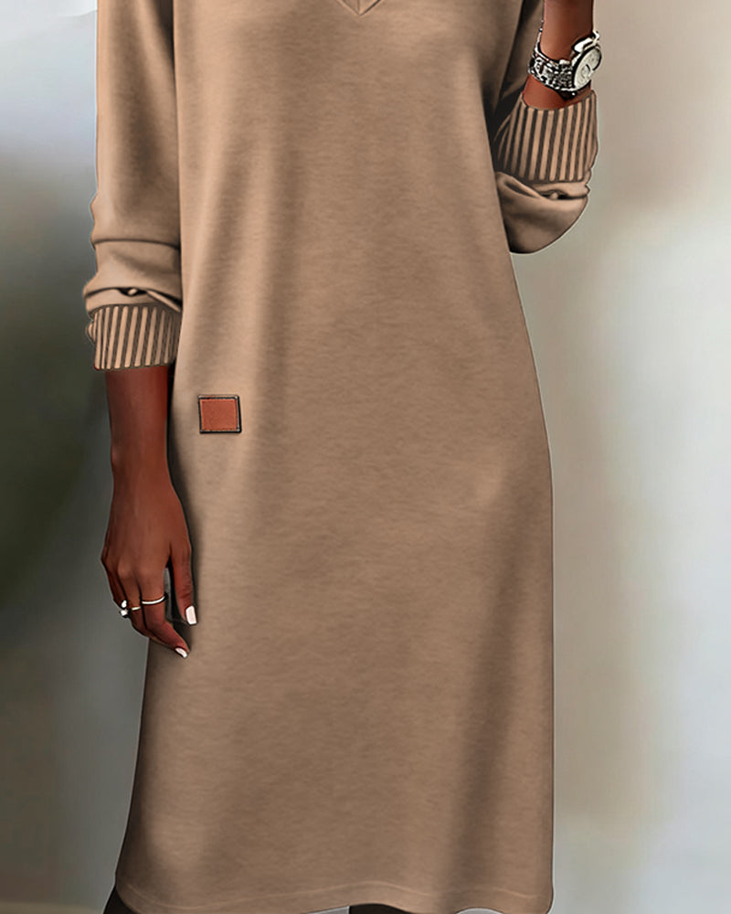 Chic women's long sleeve V-neck midi dress. A comfortable & versatile option for office & casual wear.