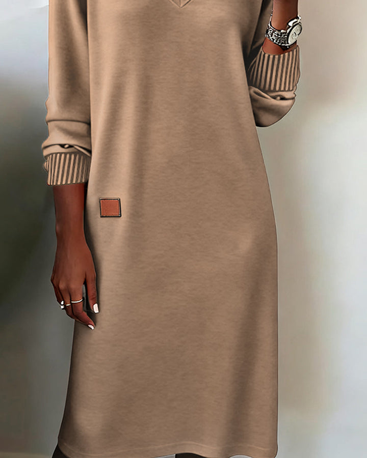 Chic women's long sleeve V-neck midi dress. A comfortable & versatile option for office & casual wear.