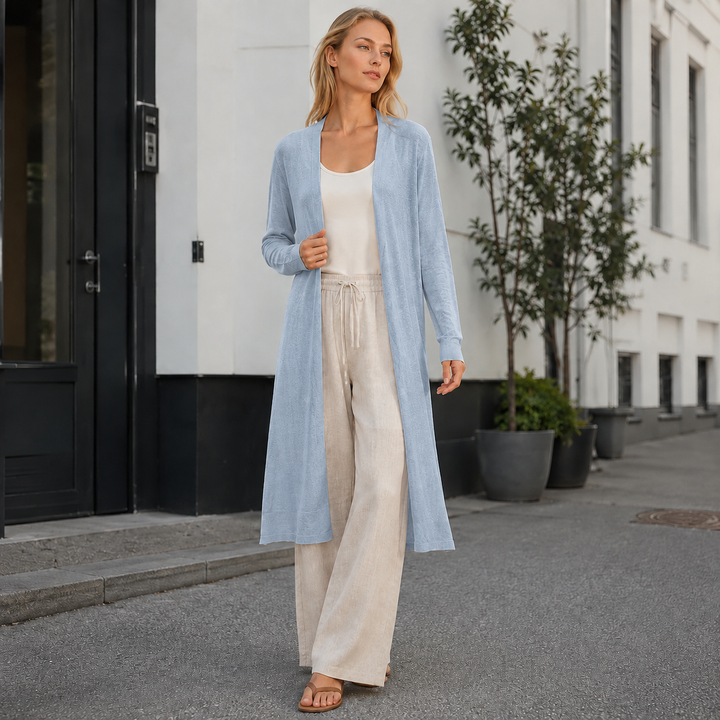 Women's long warm knit cardigan, a cozy and stylish layering piece for fall fashion.