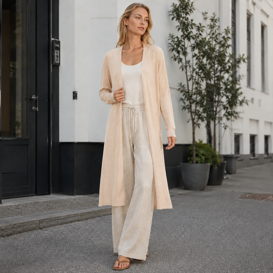 Warm, chunky knit long cardigan for women, offering comfort and a fashionable fall look.