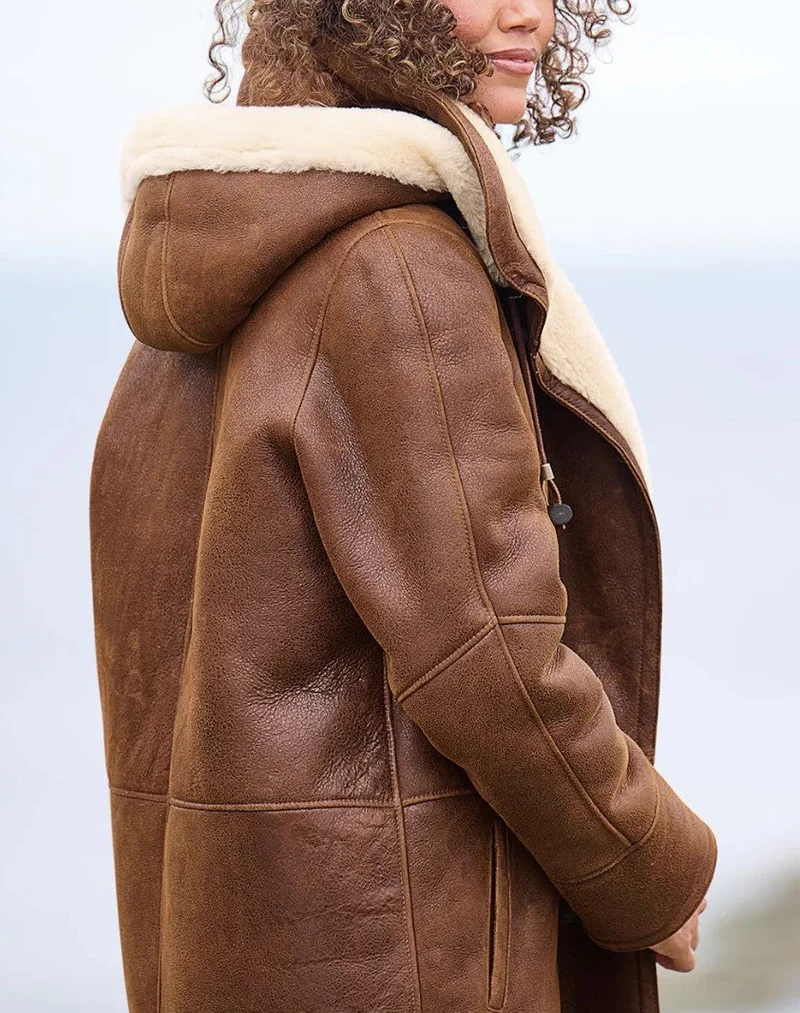 Women's long warm lightweight winter jacket, perfect for cold weather and everyday wear.