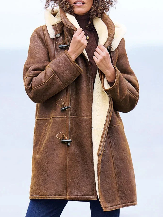 Stylish women's long hooded puffer jacket, lightweight & warm for active winter lifestyles.