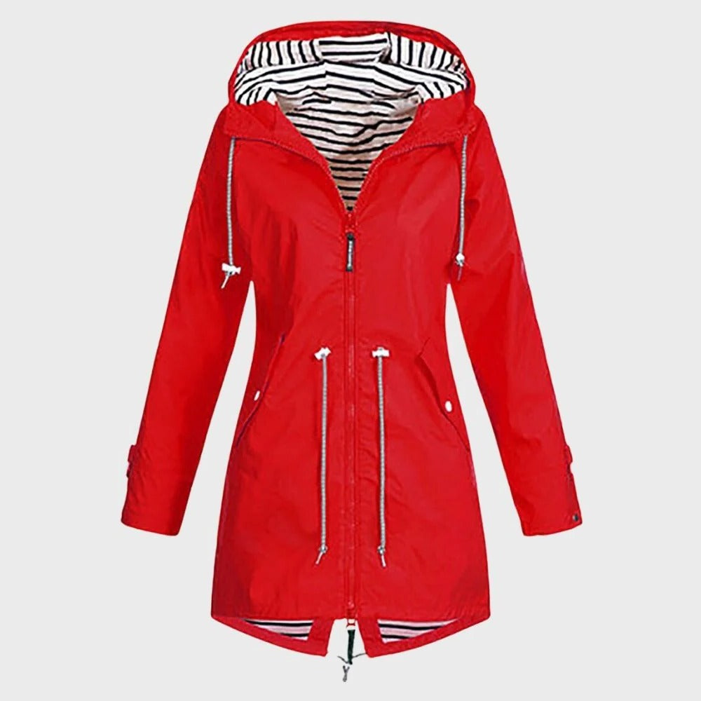 Women's long waterproof hooded rain jacket for stylish weather protection. Ideal for all-season outdoor wear.
