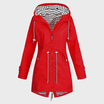 Women's long waterproof hooded rain jacket for stylish weather protection. Ideal for all-season outdoor wear.