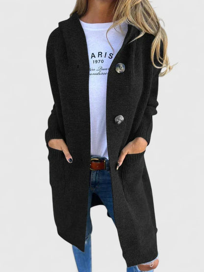 Casual women's longline button cardigan for fall fashion. Cozy knit outerwear, ideal for layering.