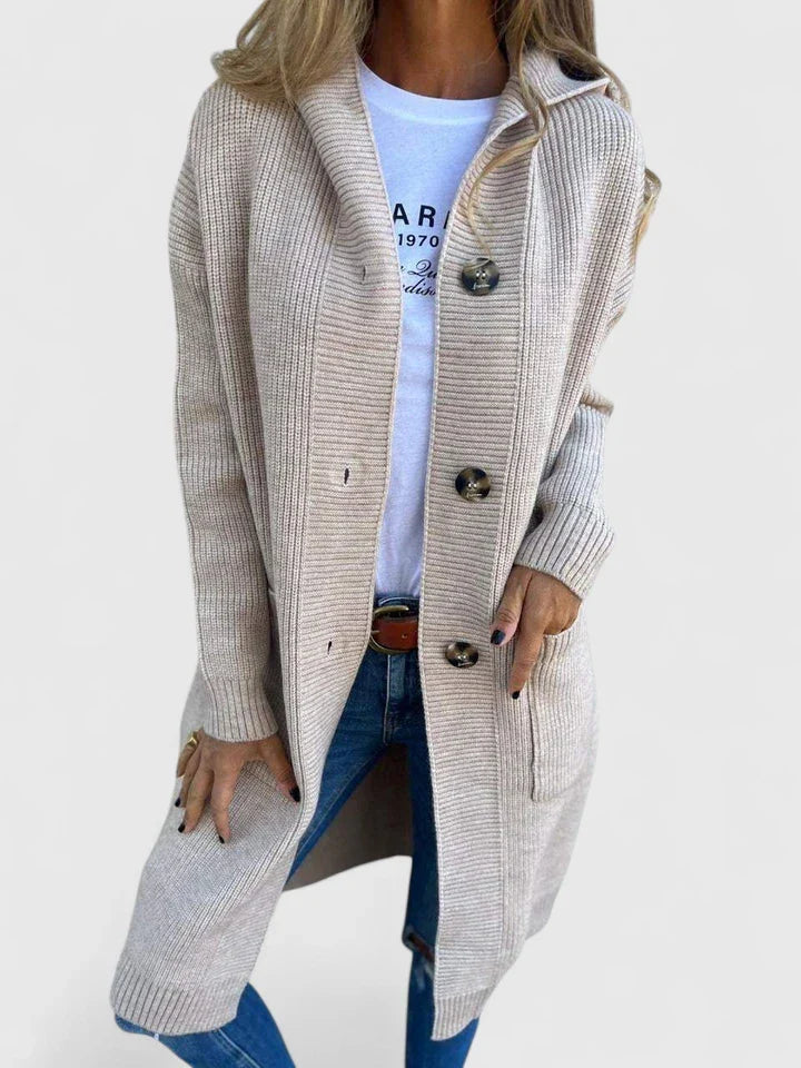 Stylish women's longline button cardigan. Versatile knit outerwear for casual fall & winter comfort.