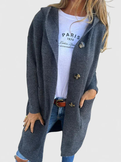 Full-length view of a women's cozy longline button cardigan. Comfortable knit, perfect casual fall outerwear.