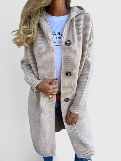 Women's comfortable longline button-front cardigan, a cozy fall fashion staple. Ideal winter layer.
