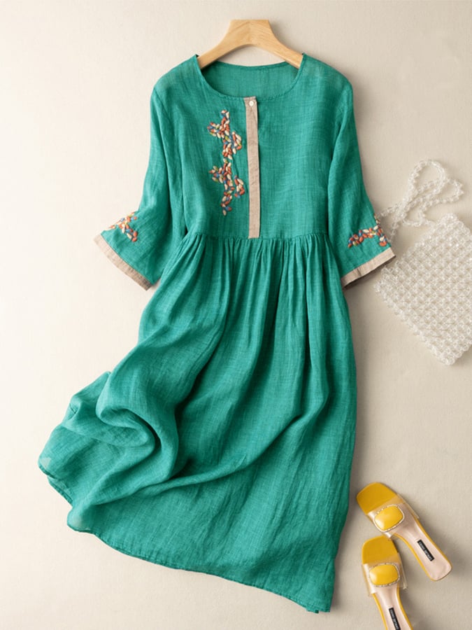Comfortable women's flared boho midi dress with beautiful embroidery, perfect for casual summer days.