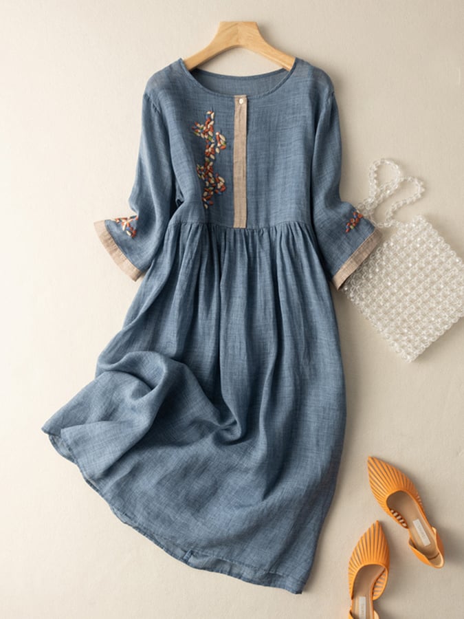 Loose fit embroidered women's midi dress, showcasing a relaxed boho style perfect for summer casual wear.