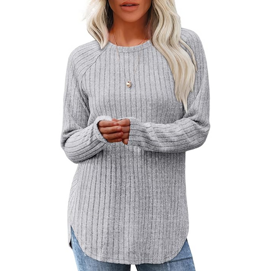 Women's loose fit crew neck sweater tunic in soft knit for effortless casual style.
