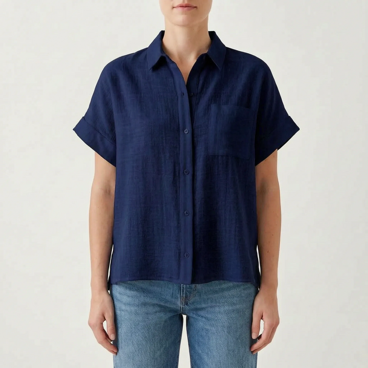 Comfortable women's loose fit short sleeve top, breathable button-down for casual summer wear.
