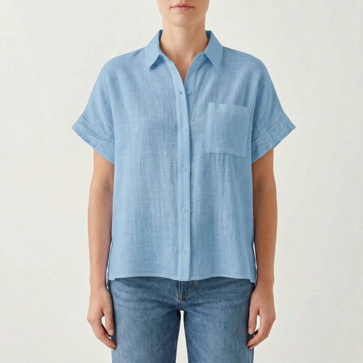 Relaxed loose fit women's short sleeve button-down shirt, lightweight & versatile for summer.
