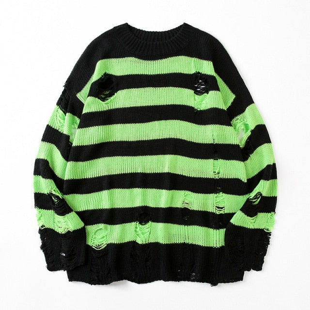 Cozy women's oversized knit striped sweater featuring a relaxed loose fit and stylish ripped details.