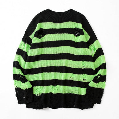Cozy women's oversized knit striped sweater featuring a relaxed loose fit and stylish ripped details.