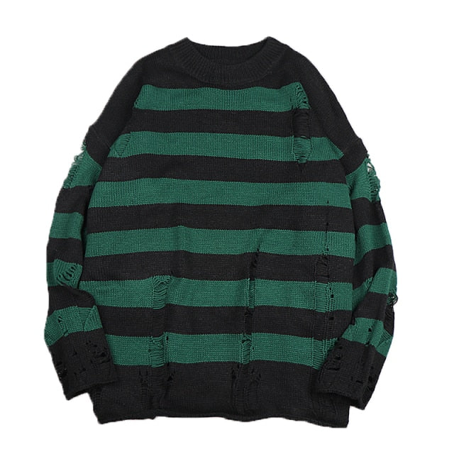Soft, comfortable women's loose striped sweater with an oversized knit and trendy ripped details for a casual look.