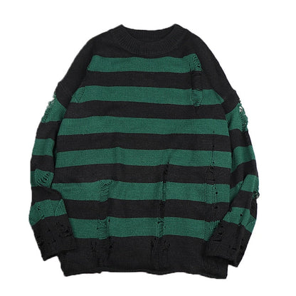 Soft, comfortable women's loose striped sweater with an oversized knit and trendy ripped details for a casual look.