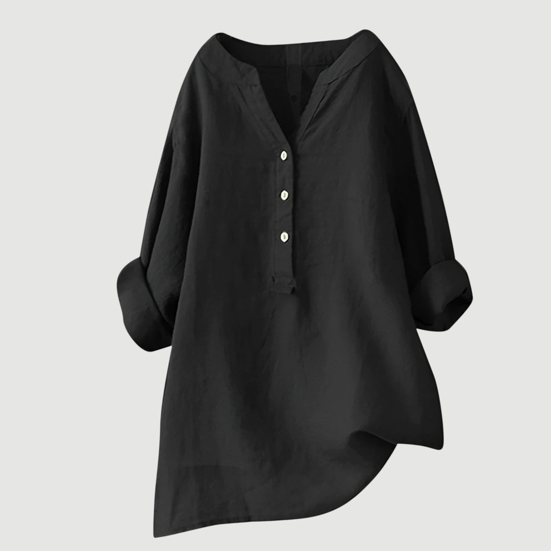 Women's loose fit V-neck shirt, offering effortless style, breathability, and comfort for any occasion.