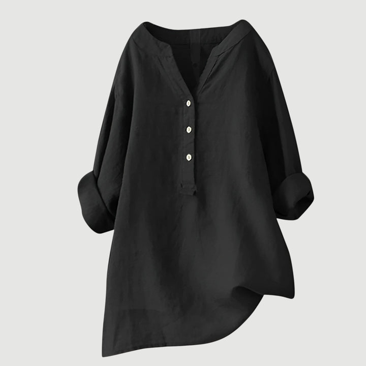 Women's loose fit V-neck shirt, offering effortless style, breathability, and comfort for any occasion.