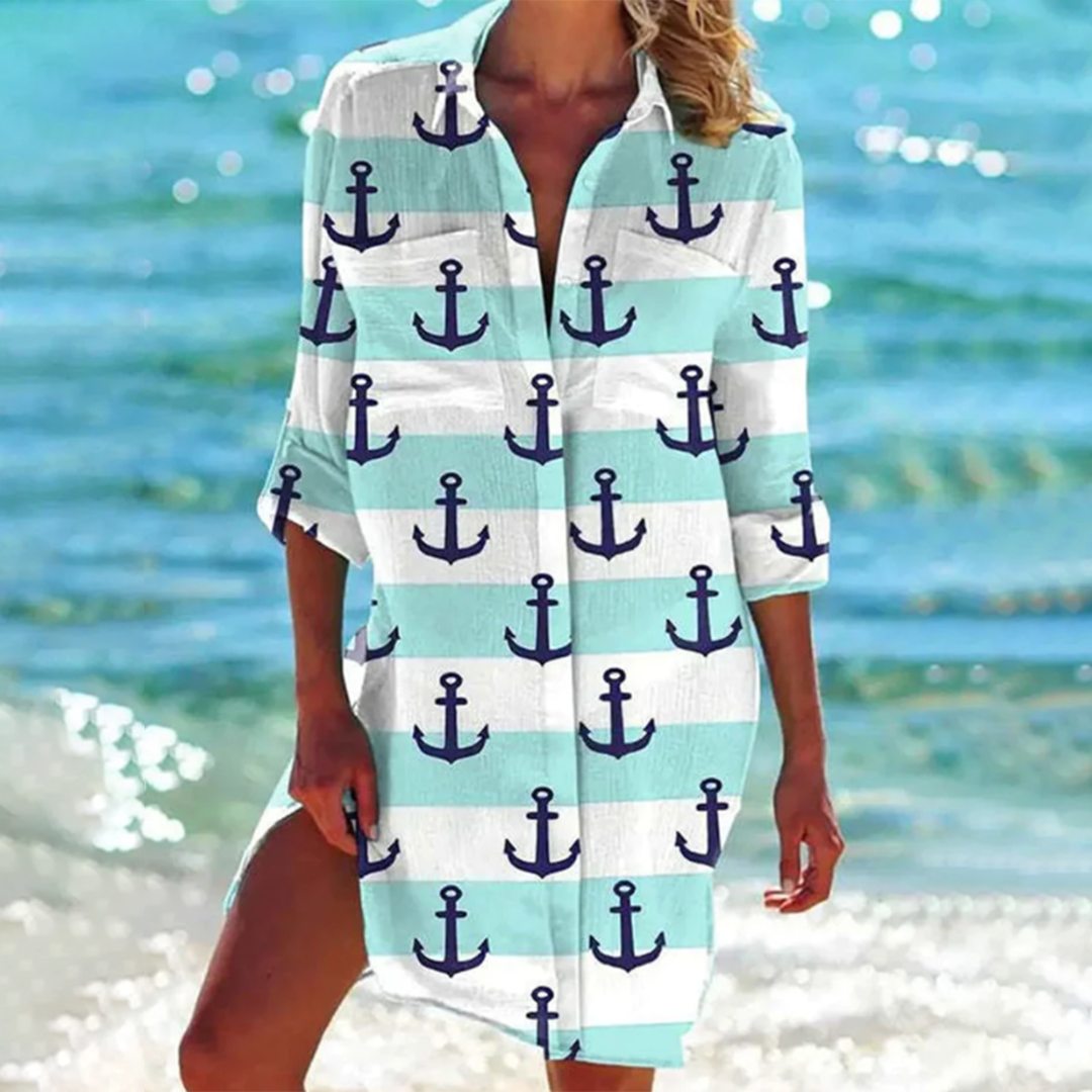Lightweight women's summer top, loose fit with eye-catching prints & pockets. Ideal short sleeve tunic for holidays.