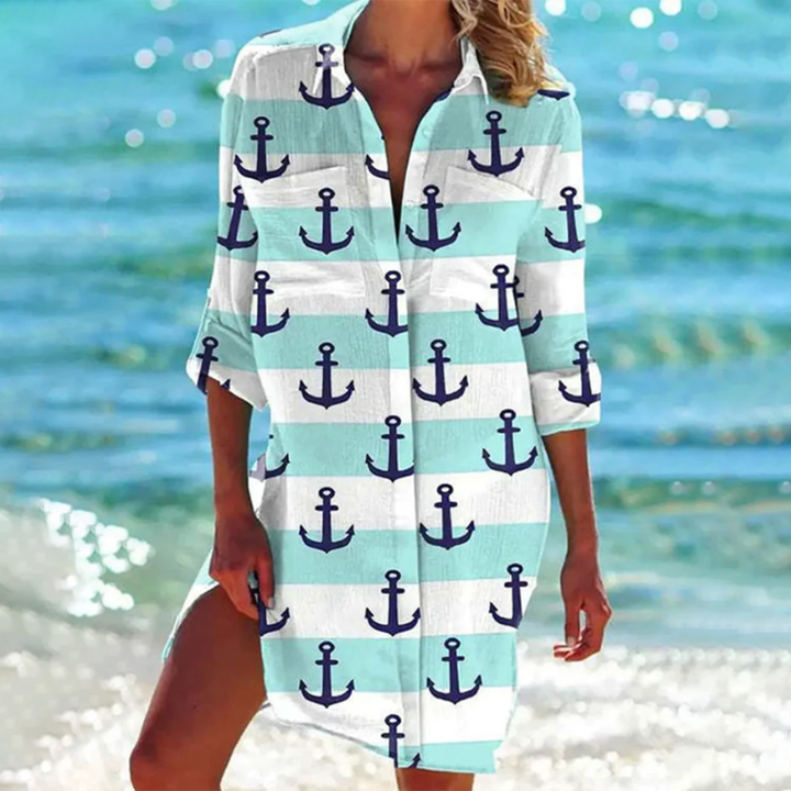 Lightweight women's summer top, loose fit with eye-catching prints & pockets. Ideal short sleeve tunic for holidays.