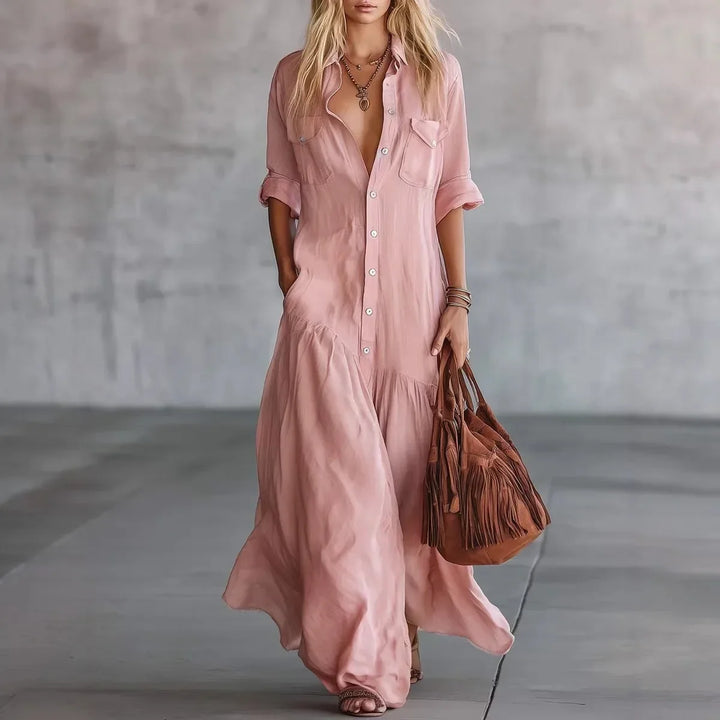Stylish women's long summer tiered dress with button-down detail, great for beach or everyday fashion.