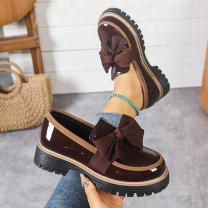 Stylish women's Lucente platform loafers in black patent finish with a cute bowknot, perfect comfortable flats.