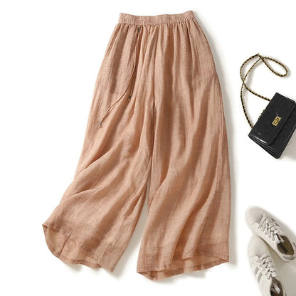 Stylish breezy wide-leg women's pants with a relaxed fit, ideal for beachwear & warm weather comfort.