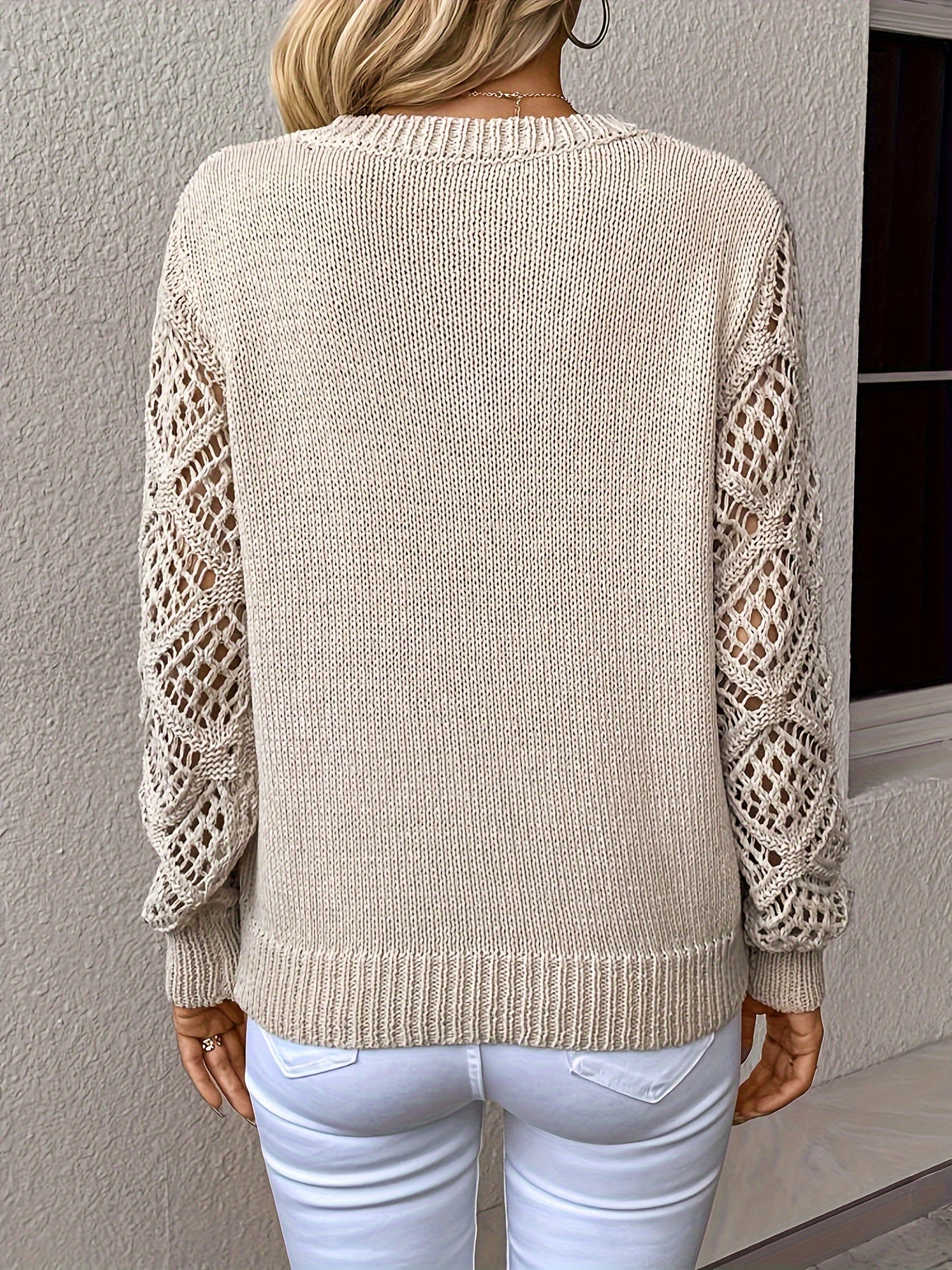 Casual yet chic Luna V-neck knit sweater for women, showcasing unique hollow-out long sleeves.