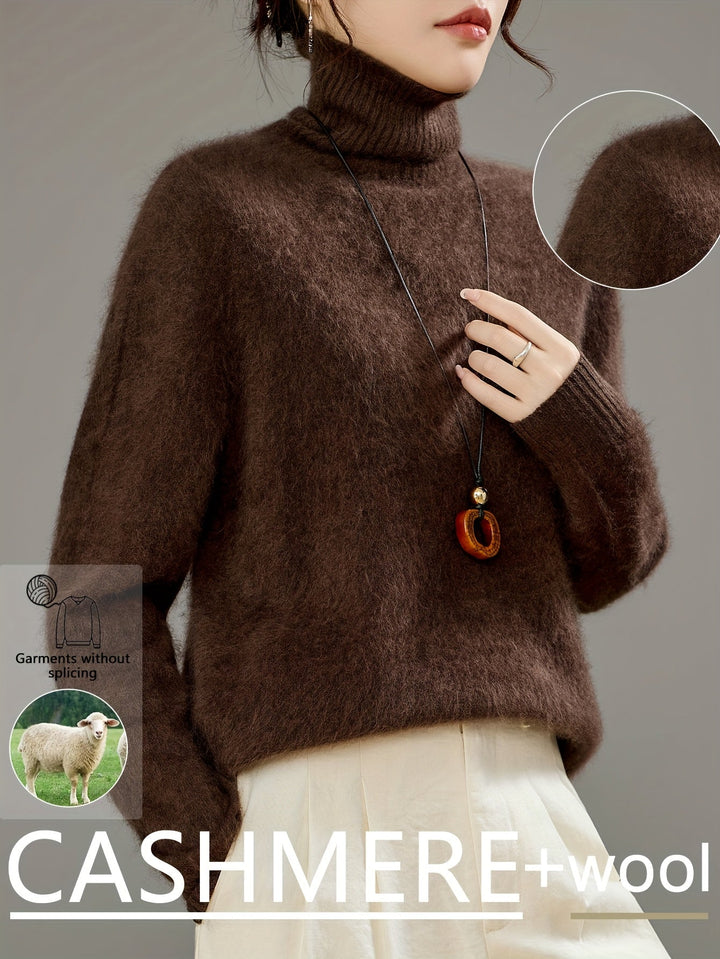 Elegant women's luxe turtleneck sweater. Premium quality knit, offering both warmth & sophisticated style.