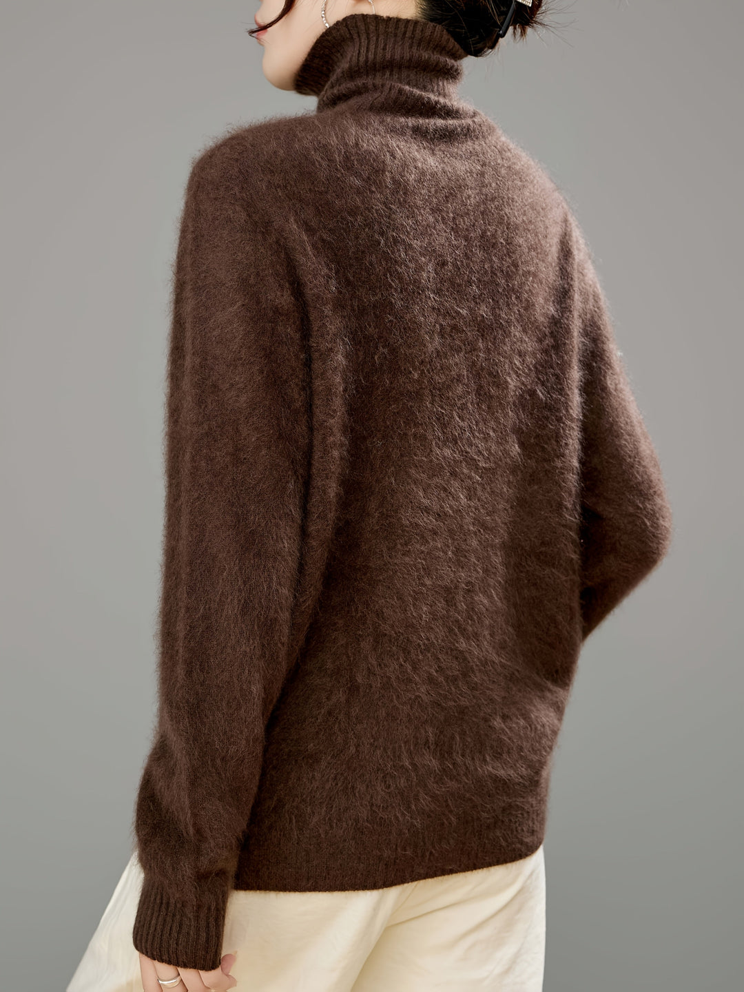 High-neck women's premium turtleneck sweater. Cozy, warm & stylish, essential for winter layering.