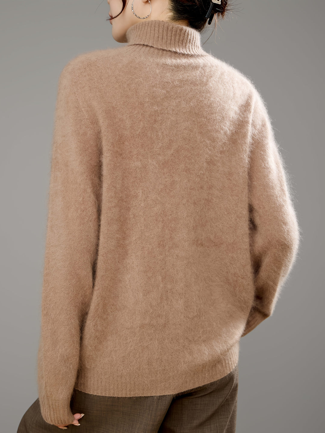 Comfortable women's relaxed fit turtleneck sweater. Soft, warm knit for cozy cold weather styling.