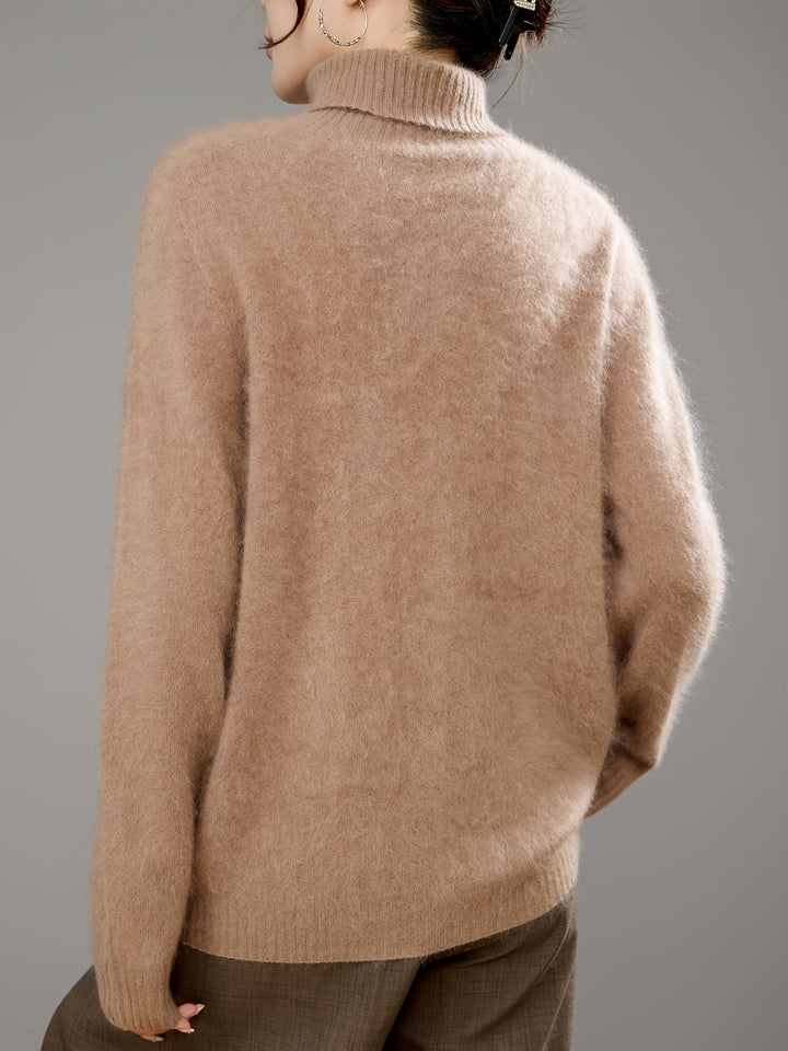 Comfortable women's relaxed fit turtleneck sweater. Soft, warm knit for cozy cold weather styling.