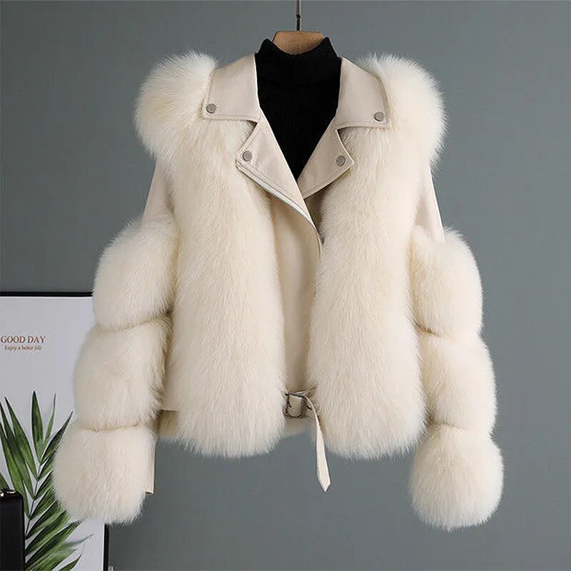Chic beige women's warm outerwear jacket, luxurious and cozy for elegant winter wear.