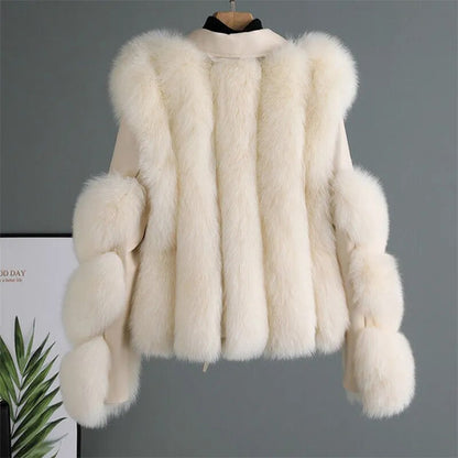 Luxurious brown women's winter jacket with a relaxed fit, ideal for warm and stylish outerwear.