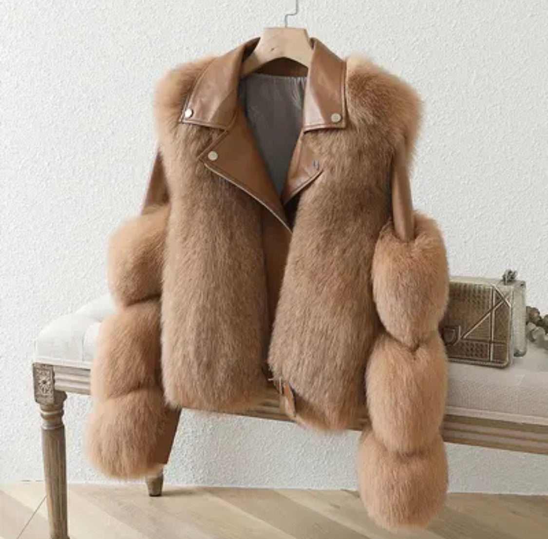 Cozy gray women's luxurious jacket, a chic relaxed fit outerwear piece for cold weather.
