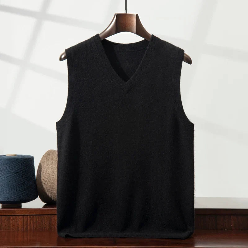 Versatile women's cashmere vest, a soft knit V-neck for elegant layering in any season. Timeless style.