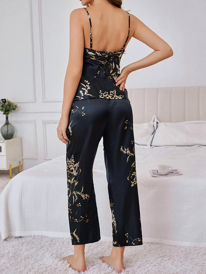 Front view of women's comfortable two-piece satin floral lounge set. Luxury sleepwear pajamas.