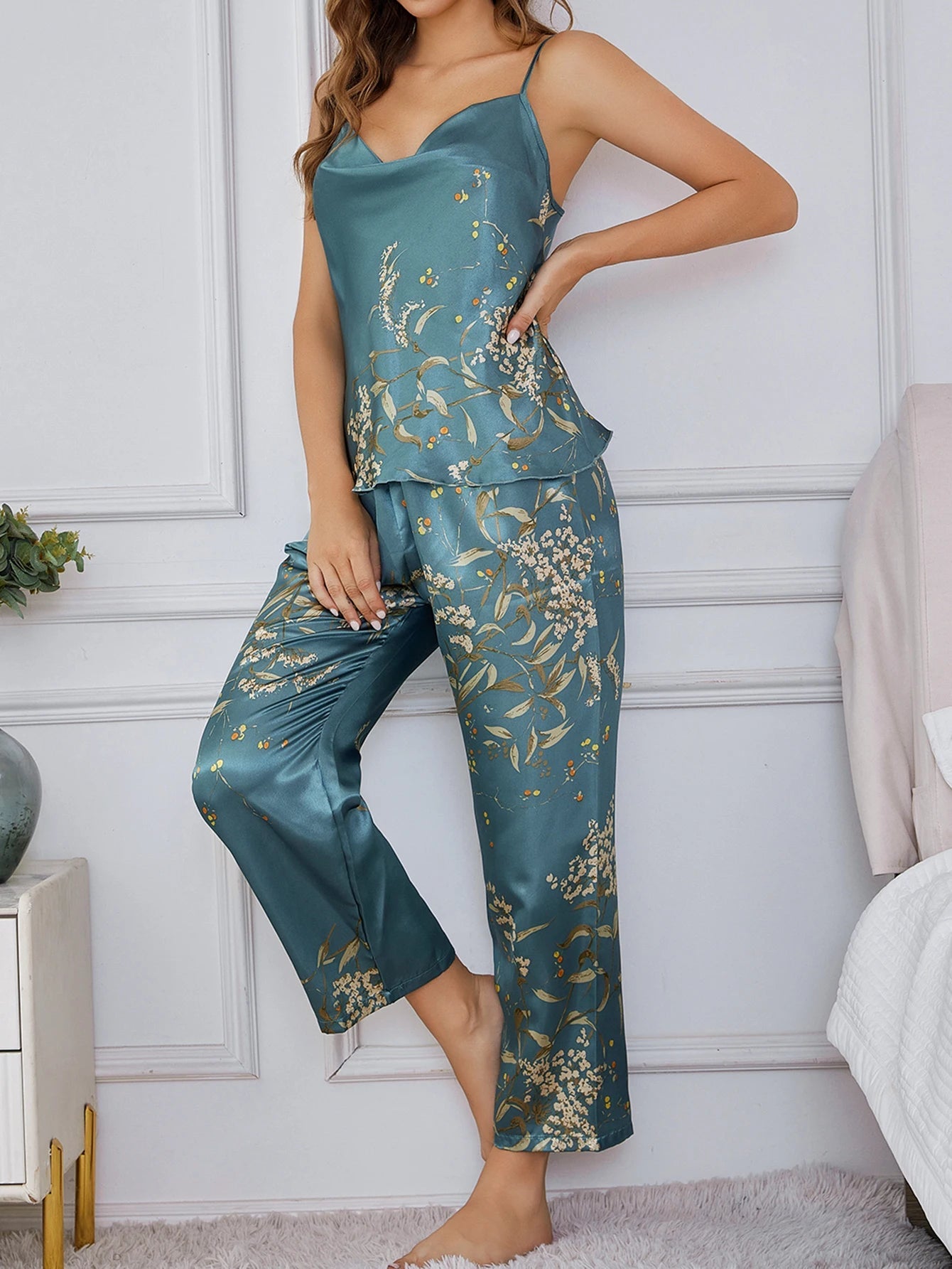 Stylish women's two-piece satin floral lounge set. Perfect luxury sleepwear for a relaxed fit.