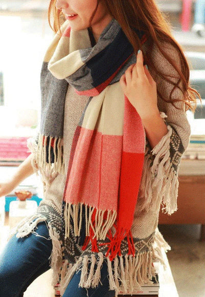 Ultra-soft women's luxury cashmere check scarf, offering ultimate warmth and comfort for winter.
