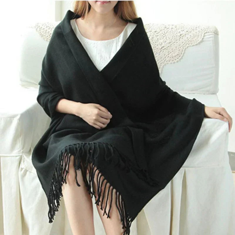 Stylish women's winter fashion accessory: a warm, soft cashmere check scarf.