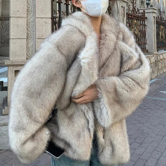 Women's luxurious soft winter coat, elegant warmth, chic design for cold weather fashion.