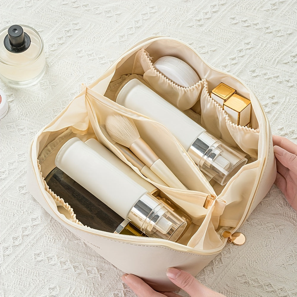 Portable women's cosmetic case, a waterproof PU leather travel bag with zipper for makeup essentials.