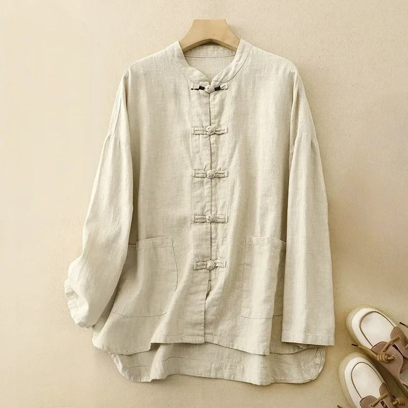 Chic women's Madina flowy button-up shirt. Elegant long-sleeve blouse, ideal for office or versatile everyday fashion.
