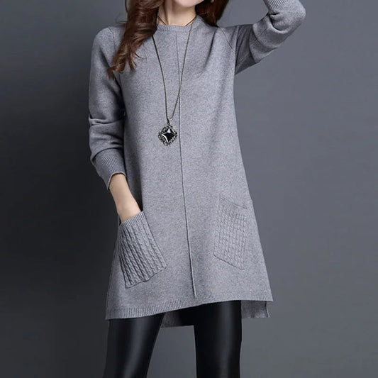 Women's Madison cable knit sweater dress, cozy relaxed fit midi length for winter fashion with pockets.